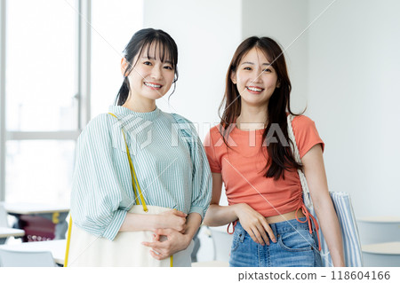 Female university students walking through a classroom. Photo courtesy of Denpa Gakuen, Tokyo Electronics College. Female university students walking through a classroom. Photo courtesy of Denpa Gakuen, Tokyo Electronics College. 118604166