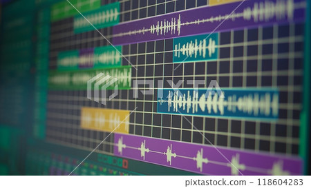 Empty desk equipped with mixing console and music recording tools in home studio, professional equipment used in producing and creating soundtracks. Stereo amplifier and equalizer. 118604283