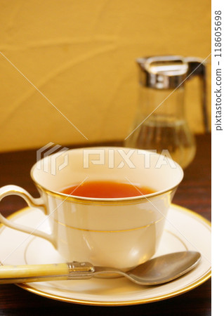 Tea in a tea cup Tea in a tea cup 118605698