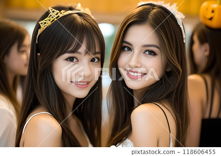 Two women enjoying a Halloween party 118606455