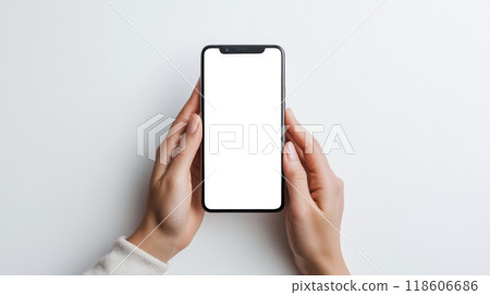 The hand of a person holding a smartphone The hand of a person holding a smartphone 118606686