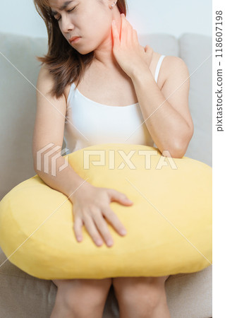 Woman having Neck and Shoulder pain at home. Muscle painful due to Myofascial pain syndrome and Fibromyalgia, rheumatism, Scapular pain, Cervical Spine. ergonomic concept 118607198