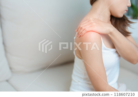 Woman having Shoulder and Neck pain at home. Muscle painful due to Myofascial pain syndrome and Fibromyalgia, rheumatism, Scapular pain, Cervical Spine. ergonomic concept Woman having Shoulder and Neck pain at home. Muscle painful due to Myofascial pain syndrome and Fibromyalgia, rheumatism, Scapular pain, Cervical Spine. ergonomic concept 118607210