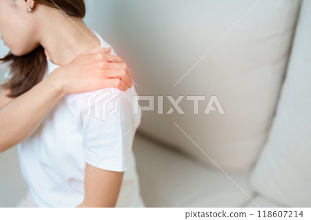 Woman having Shoulder and Neck pain at home. Muscle painful due to Myofascial pain syndrome and Fibromyalgia, rheumatism, Scapular pain, Cervical Spine. ergonomic concept Woman having Shoulder and Neck pain at home. Muscle painful due to Myofascial pain syndrome and Fibromyalgia, rheumatism, Scapular pain, Cervical Spine. ergonomic concept 118607214