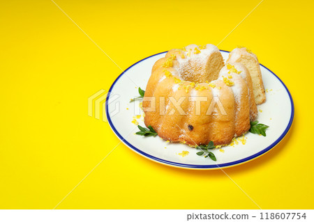 Tasty bake food concept - delicious lemon cake 118607754