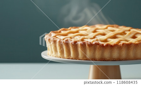Freshly Baked Apple Pie with Lattice Crust and Steaming Hot Filling Freshly Baked Apple Pie with Lattice Crust and Steaming Hot Filling 118608435