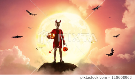 girl in devil costume at Halloween 118608963