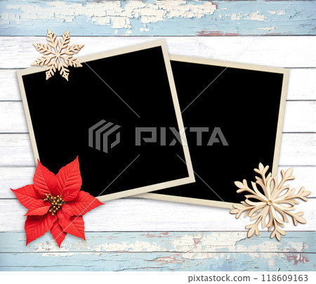 Vintage eco friendly holiday backdrop. Christmas background with two retro photo, poinsettia, snowflake on wooden boards. Copy space for text. Ecology, environmental conservation, zero waste concept 118609163