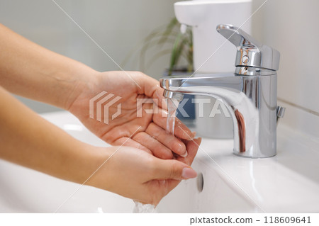 Process of woman wash her hands in bathroom Process of woman wash her hands in bathroom 118609641