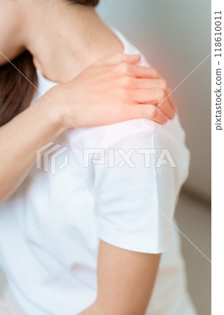 Woman having Shoulder and Neck pain at home. Muscle painful due to Myofascial pain syndrome and Fibromyalgia, rheumatism, Scapular pain, Cervical Spine. ergonomic concept Woman having Shoulder and Neck pain at home. Muscle painful due to Myofascial pain syndrome and Fibromyalgia, rheumatism, Scapular pain, Cervical Spine. ergonomic concept 118610011