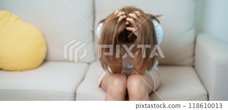 Stress, Sad and unhappy concepts. Alone asian Woman having headache, Young female feeling frustrated, exhausted and suffering 118610013
