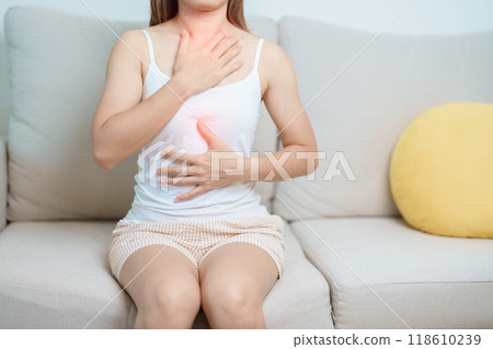 Gastroesophageal Reflux Disease or GERD, Acid reflux disease, Gastro Oesophageal or GORD and Dyspepsia concept. woman having Stomach ache and Esophageal pain due to Digestion system problem Gastroesophageal Reflux Disease or GERD, Acid reflux disease, Gastro Oesophageal or GORD and Dyspepsia concept. woman having Stomach ache and Esophageal pain due to Digestion system problem 118610239
