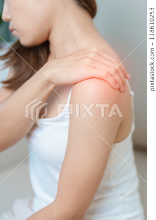 Woman having Shoulder and Neck pain at home. Muscle painful due to Myofascial pain syndrome and Fibromyalgia, rheumatism, Scapular pain, Cervical Spine. ergonomic concept 118610253