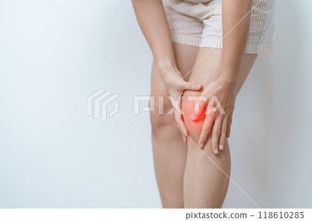 woman having knee ache and muscle pain due to Runners Knee or Patellofemoral Pain Syndrome, osteoarthritis, arthritis, rheumatism and Patellar Tendinitis. medical concept 118610285