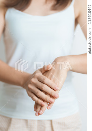 Skin care lotion and Skin body cream Moisturizing, Sunscreen and Healthy Daily Routine concepts. Beauty Woman applying moisturizing skincare cream on hand and body at home 118610442