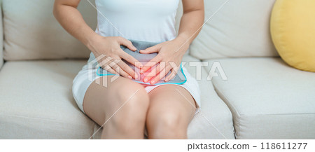 Menstruation period cycle of monthly and Stomachache concepts. woman having abdomen pain and menstrual ache with hot water bottle, illness female suffer from premenstrual ache and body Health problem Menstruation period cycle of monthly and Stomachache concepts. woman having abdomen pain and menstrual ache with hot water bottle, illness female suffer from premenstrual ache and body Health problem 118611277