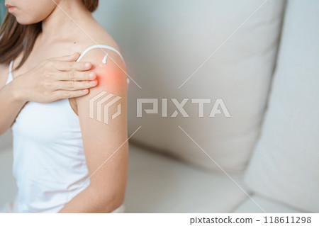 Arthritis and Muscle Pain Relief Cream concept. Woman having Shoulder and Arm pain at home. Muscle painful due to Myofascial pain syndrome and Fibromyalgia, rheumatism, Scapular pain, Cervical Spine Arthritis and Muscle Pain Relief Cream concept. Woman having Shoulder and Arm pain at home. Muscle painful due to Myofascial pain syndrome and Fibromyalgia, rheumatism, Scapular pain, Cervical Spine 118611298