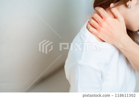 Woman having Neck and Shoulder pain at home. Muscle painful due to Myofascial pain syndrome and Fibromyalgia, rheumatism, Scapular pain, Cervical Spine. ergonomic concept Woman having Neck and Shoulder pain at home. Muscle painful due to Myofascial pain syndrome and Fibromyalgia, rheumatism, Scapular pain, Cervical Spine. ergonomic concept 118611302