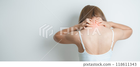 Woman having Neck and Shoulder pain at home. Muscle painful due to Myofascial pain syndrome and Fibromyalgia, rheumatism, Scapular pain, Cervical Spine. ergonomic concept 118611343