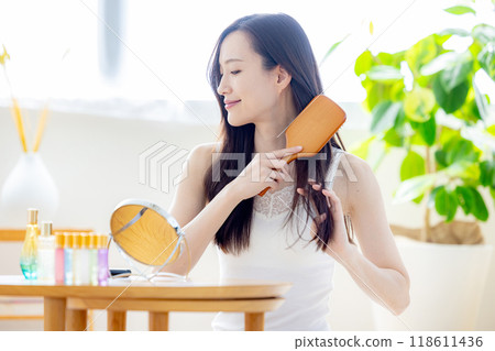 A woman with hair A woman with hair 118611436