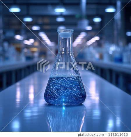 A clean, white, shining lab features blue bubbling flask on pristine table, showcasing modern scientific environment filled with glassware and bright lighting 118611613