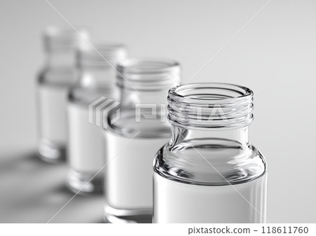 Minimalist clear glass beakers and bottles arranged in row, showcasing their elegant design and transparency. simplicity of glass creates serene and modern aesthetic 118611760