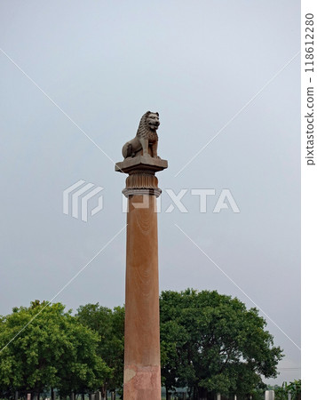 Lion statues of the Ashoka Pillar at the ruins of a monastery in Vaishali, one of the sacred Buddhist sites in India, a sacred place for the offering of honey to monkeys Lion statues of the Ashoka Pillar at the ruins of a monastery in Vaishali, one of the sacred Buddhist sites in India, a sacred place for the offering of honey to monkeys 118612280