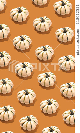 Pattern of white pumpkins on orange background vertical banner Pattern of white pumpkins on orange background vertical banner 118612531
