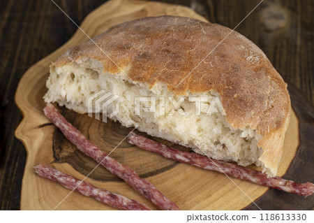homemade wheat tortilla on the table with pieces of meat 118613330