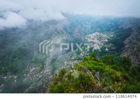 Aerial view of Curral das Freiras village. Miradouro da Eira do Serrado, Madeira, Portugal Aerial view of Curral das Freiras village. Miradouro da Eira do Serrado, Madeira, Portugal 118614074