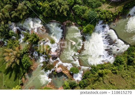 Aerial landscape in Quay Son river, Trung Khanh, Cao Bang, Vietnam with nature, green rice fields and rustic indigenous houses 118615270