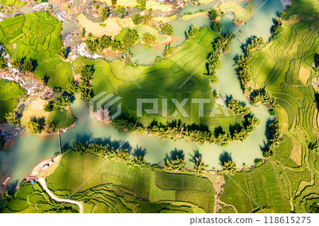 Aerial landscape in Quay Son river, Trung Khanh, Cao Bang, Vietnam with nature, green rice fields and rustic indigenous houses. 118615275