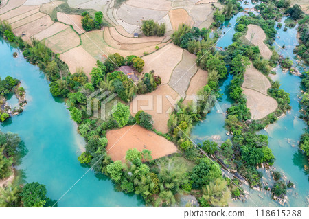 Aerial landscape in Quay Son river, Trung Khanh, Cao Bang, Vietnam with nature, green rice fields and rustic indigenous houses. Aerial landscape in Quay Son river, Trung Khanh, Cao Bang, Vietnam with nature, green rice fields and rustic indigenous houses. 118615288