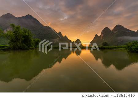 Rice terrace paddle field in sunrise at Phong Nam, Trung Khanh, Cao Bang, Vietnam Rice terrace paddle field in sunrise at Phong Nam, Trung Khanh, Cao Bang, Vietnam 118615410