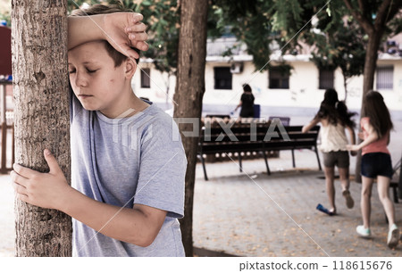Playing hide and seek. boy closed eyes his hands 118615676