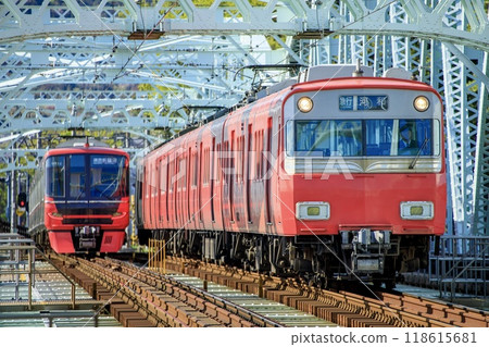 Meitetsu 6500 series and 9500 series trains passing each other on Inuyama Bridge Meitetsu 6500 series and 9500 series trains passing each other on Inuyama Bridge 118615681