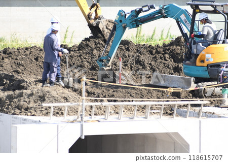 Excavator: Kashio River Reservoir Bank Construction 118615707