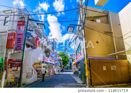 Kawasaki cityscape, Japan, September. The east exit of Futako-Shinchi Station under the elevated railway. View of the shopping street in front of the station, Futako-Odori Showakai, etc. 118615719