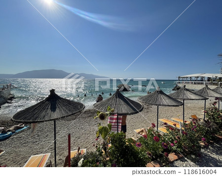 Rocky beach and crystal turquoise water of Ionian Sea in Albania. 118616004