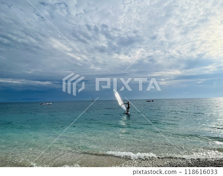 Rocky beach and crystal turquoise water of Ionian Sea in Albania. Rocky beach and crystal turquoise water of Ionian Sea in Albania. 118616033