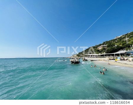 Rocky beach and crystal turquoise water of Ionian Sea in Albania. 118616034
