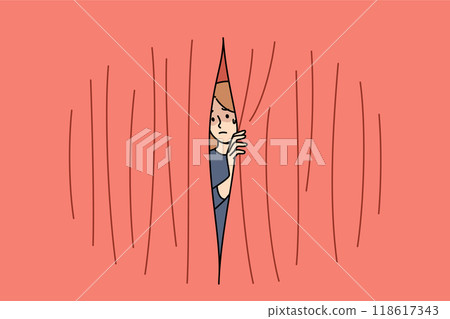Woman experiences phobia of public speaking and looks out from behind scenes of theater 118617343