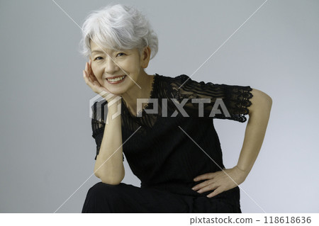Portrait of a senior woman with grey hair Portrait of a senior woman with grey hair 118618636