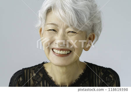 Portrait of a smiling senior woman with gray hair Beauty Portrait of a smiling senior woman with gray hair Beauty 118619398