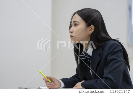 Profile of a high school girl studying. Photo courtesy of Ariake College of Education and Arts. 118621147