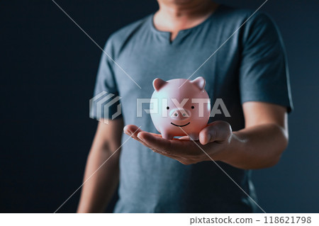 businessman show on the piggy bank on hand, family finance plan concept, fundraising, superannuation, donation, saving, charity, investment, financial crisis concept. 118621798