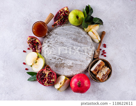 Rosh Hashana concept with honey, apple and pomegranate 118622611