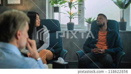 Multiethnic couple on couples therapy with psychologist Multiethnic couple on couples therapy with psychologist 118622856