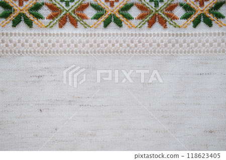 Traditional Hand-Embroidered Fabric with Geometric Floral Pattern in Earth Tones Traditional Hand-Embroidered Fabric with Geometric Floral Pattern in Earth Tones 118623405