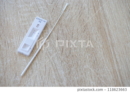 A COVID-19 test and a swab test A COVID-19 test and a swab test 118623663